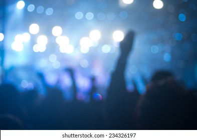 concert background, hand up , blurry background, beautiful bokeh live concert