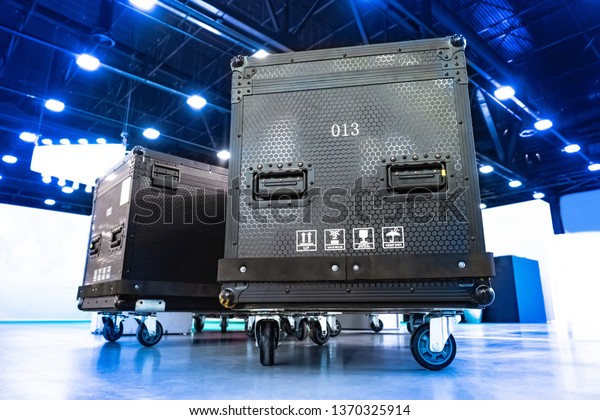 Concert boxes\
on wheels. Transportation of scenery and concert equipment. Trunks\
for stage equipment. Shipping cases for musical instruments.\
Concert activity. Organization of the\
show.