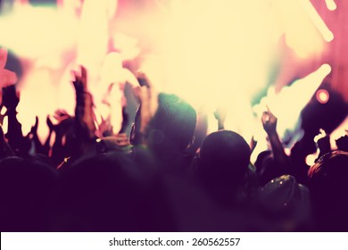 Concert, Disco Party. People With Hands Up Having Fun In Night Club Lights. Vintage Mood