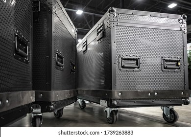 Concert equipment. Containers for transportation of equipment. Reinforced boxes on wheels. Containers with handles and wheels for easy transportation. Transportation of equipment for the stage.