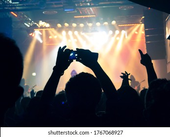 Concert Photography During A Gig,this Is The Point Of View Of The Crowd In Front Of A Stage During A Music Festival