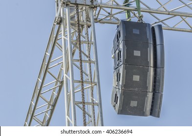 Concert Sound System On Metal Structures At Height Outdoor With Blue Sky Background