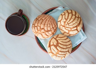 Concha, Mexican sweet bread with a cup of coffee.