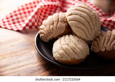 Conchas. Mexican sweet bread roll with seashell-like appearance, Usually eaten with coffee or hot chocolate at breakfast or as an afternoon snack.