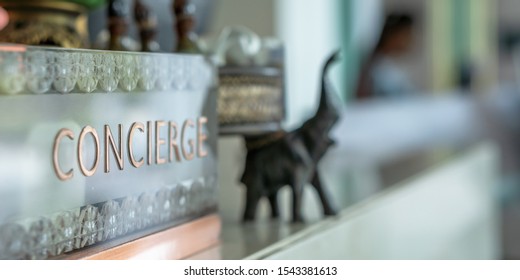 Concierge Service Counter Of Hotel, Restaurant Or Apartment's Front Desk In Luxury Reception Hall In Thailand With Staff Working For Serving Tourist Guest Or Check-in Customers