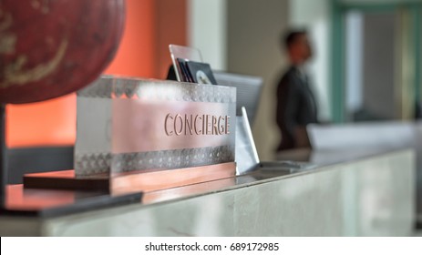 Concierge Service Counter Of Hotel, Restaurant Or Apartment's Front Desk In Luxury Reception Hall With Staff Working For Serving Tourist Guest Or Check-in Customers