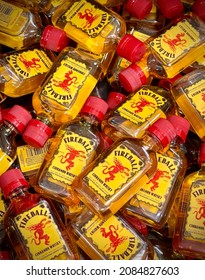 Concord, CA, USA - November 6, 2021: Looking down on lots of tiny miniature bottles of Fireball Cinnamon Whiskey in supermarket
