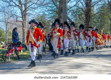 CONCORD, MA, USA - APR. 18, 2022: British Soldier In American Revolutionary War Reenactment In Minute Man National Historical Park In Concord, Massachusetts MA, USA. 