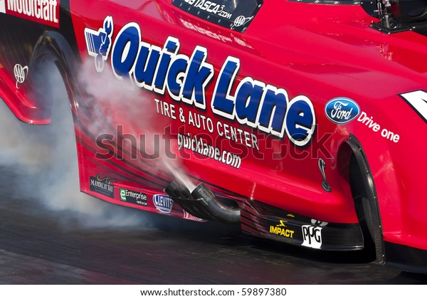 CONCORD, NC - MAR 27:  Robert Tasca III brings his\
Quicklane Ford Mustang down the track at the zMax Dragway for the\
running of the inaugural Four-Wide Nationals event in Concord, NC\
on Mar 27, 2010