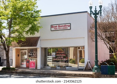 CONCORD, NC, USA-3 APRIL 2022: Office Of Bost Bonding, A Bail Bonding Company, With Law Offices Of Ben A. Cox Next Door.