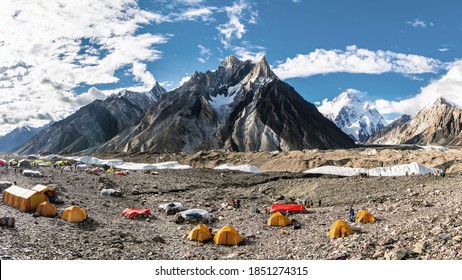 Concordia, Pakistan - 08.14.2018: View of Crystal peak, Marble peak and K2 mountain from Concordia campsite, K2 base camp trek