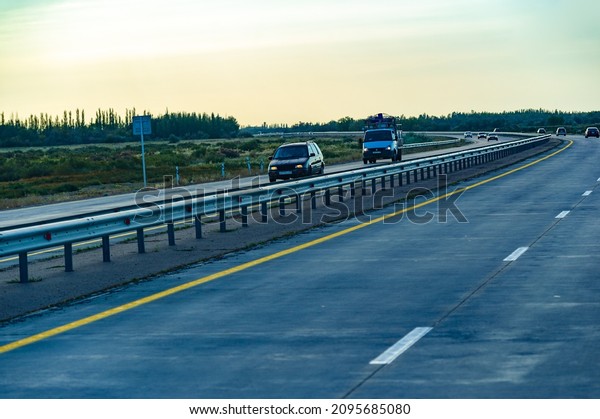 Concrete auto road. Concrete\
roads are very durable and more environmentally friendly compared\
to asphalt roads. 11 08 2021 Almaty region Central Asia\
Kazakhstan