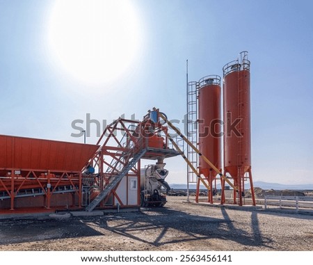 Concrete batching plant preparing concrete for a construction project