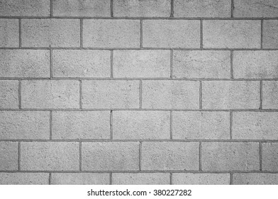 Concrete block wall seamless background and texture - Shutterstock ID 380227282