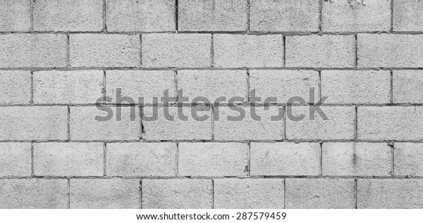 コンクリートブロックの壁のテクスチャと背景のシームレスさ の写真素材 今すぐ編集