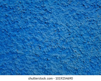 Concrete of a blue plastered wall. Dark blue plastered wall texture grunge background. Beautiful decorative navy blue plastered wall or cyan painted stucco. Plastered stucco as handmade rough paper - Shutterstock ID 1019254690