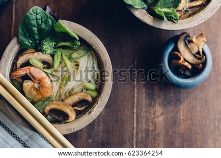 Similar – Image, Stock Photo Bowl of Asian Noodle Soup with chopsticks