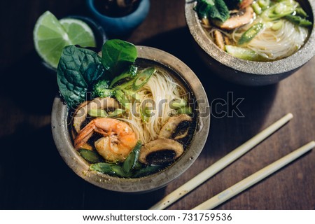 Similar – Image, Stock Photo Bowl of Asian Noodle Soup with chopsticks