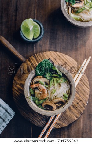 Similar – Image, Stock Photo Bowl of Asian Noodle Soup with chopsticks