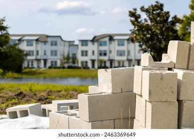 Concrete cinder blocks outside an apartment building construction