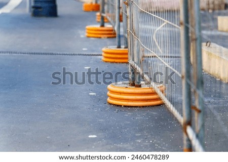 Concrete circle base for installing temporary fence metal posts