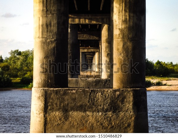 Concrete\
columns under the bridge. Concrete road\
bridge