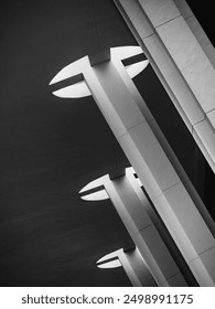 Concrete columns Void pattern Contrast lighting Architecture details