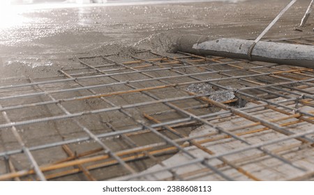 Concrete concreting floors of buildings in construction site. Concept pouring cement to base plate. - Powered by Shutterstock