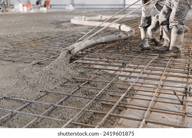 Concrete concreting floors of buildings in construction site. Concept pouring cement to base plate. - Powered by Shutterstock