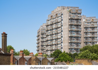 Concrete council blocks at Cotton Gardens Estate and terraced houses at the foreground in London