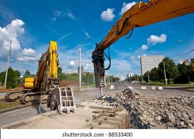 Concrete Crusher and Hydraulic Crushing Hammer demolishing reinforced concrete structures
