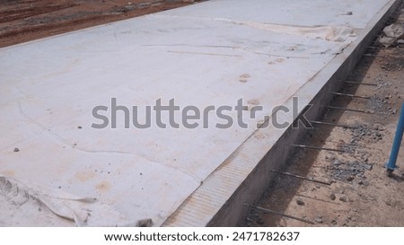 concrete curing process for rigid pavemnet work on toll roads. concrete curing, curing, curing concrete, cement, water, civil engineering, station, building, asphalt, highway, road construction, tol t