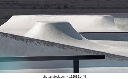 Concrete Curved Walls Of Bowl Park In Skatepark