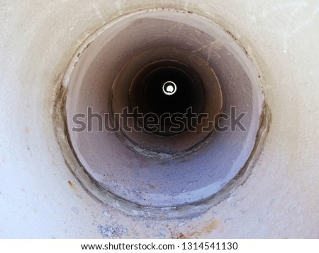 Similar – Image, Stock Photo Look through stone pipes with resistant glaze placed on the ground in front construction site