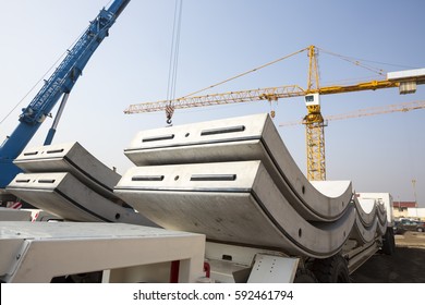 Concrete elements for subway tunnel  Big   heavy parts for the underground cylindrical tunnel construction  Cranes 
