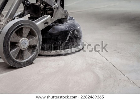 concrete floor grinding machine is an essential tool used to prepare the surface of a concrete floor before the installation of a new layer. 