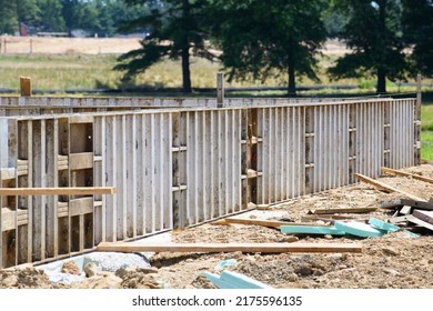 Concrete Foundation With Reinforcement And Metal Slab Construction Site, Process Of House Building Formwork For Foundation New