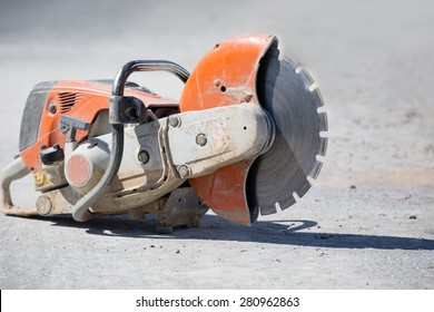 Concrete Gasoline Saw Grinder At Construction Site 