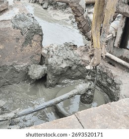 concrete grouting process for micro piling installation works for foundation works on muddy and slurry site construction.