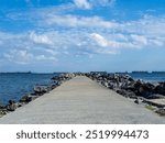 A concrete harbor road on a sunny day, pier road