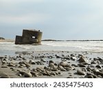 The concrete lookout post was washed into the sea at the west coast of Taiwan.
