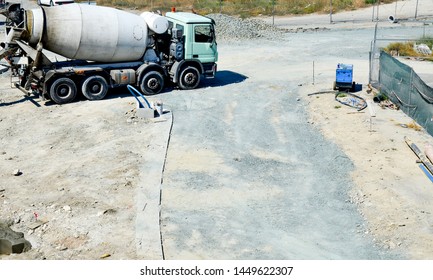 concrete mixer drove up to the construction site
