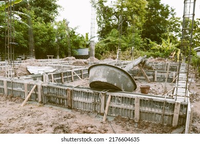 
Concrete Mixer Tray Tilt On Beams That Are Pouring Concrete. On The Construction Site