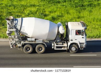 Concrete Mixer Truck rides the road highway