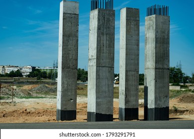 Concrete pillars for an aero duct at the roadside.
