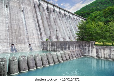 Concrete Pillars For Breaking The Water At The Base Of The Dam. The Base Of The Poiana Uzului Dam.