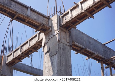 Concrete Pole Branch Meeting Covered with Wood Mold. Photo of Abandoned Concrete Pole With Four Branches. - Powered by Shutterstock