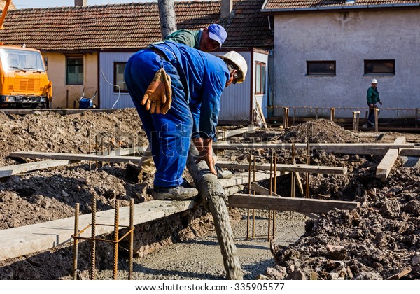 Concrete Pouring Construction Workers Pouring Concrete Stock Photo ...