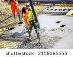 Concrete pouring on the construction site.