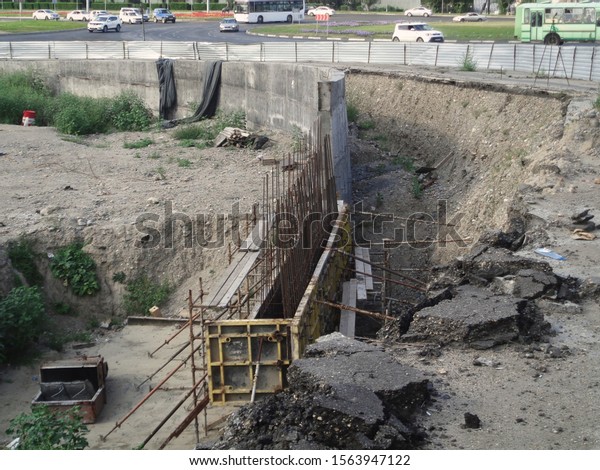 Concrete\
pouring. Reinforced concrete wall. Road construction. Entrance to\
the bridge. Ust-Kamenogorsk\
(Kazakhstan)